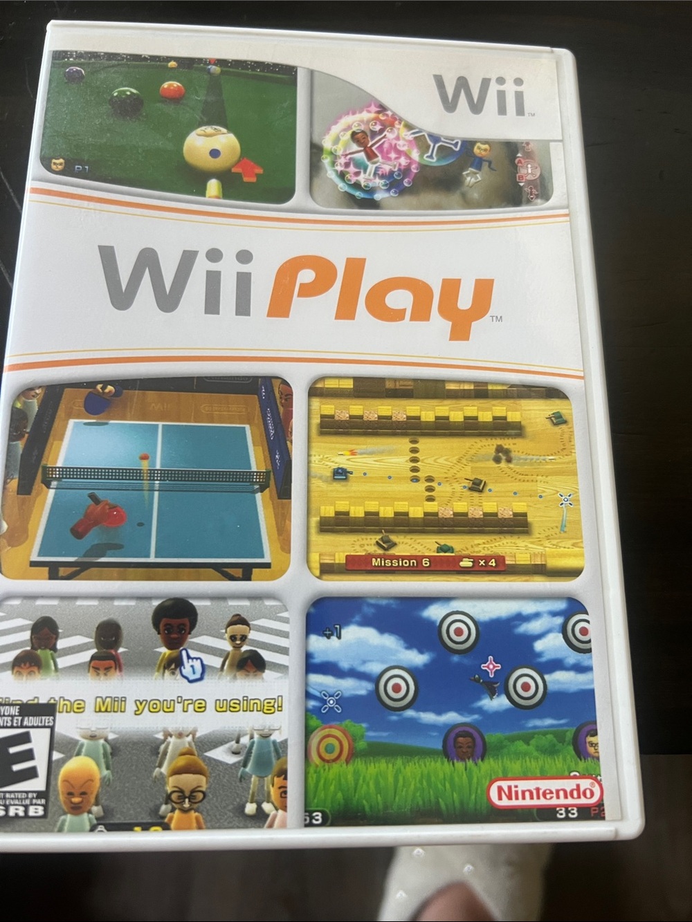 Nintendo WiiPlay Video Game - White and Orange Cover